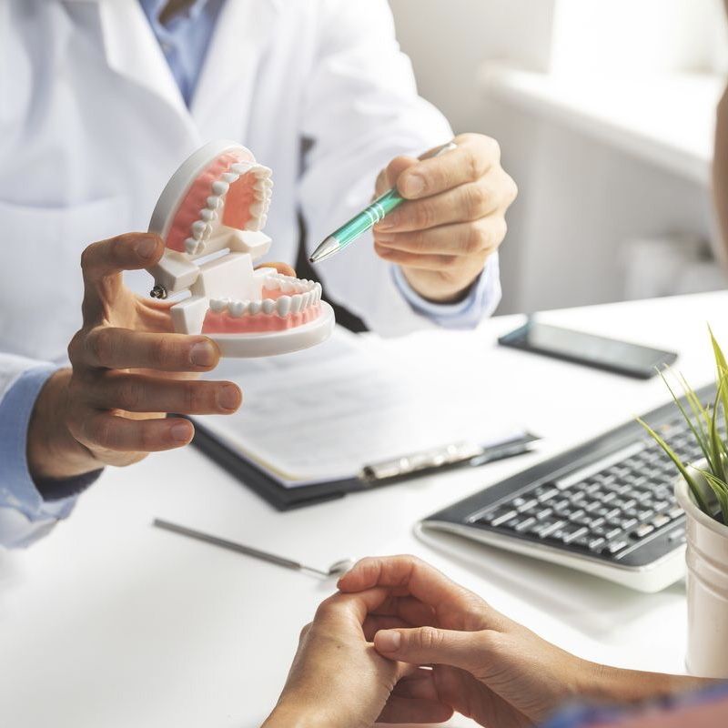 general dentist explaining procedure